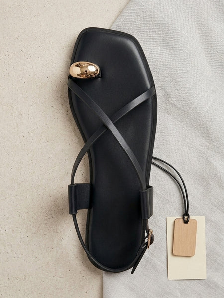 Black toe ring sandals
